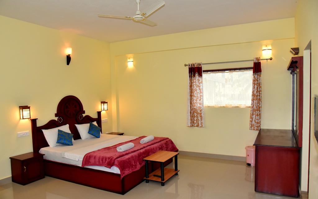 Jungle Palace Homestay Thekkady Habitación foto